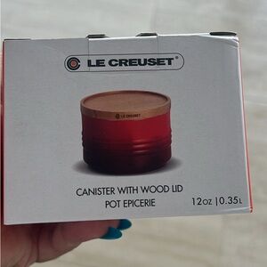 Brand new with tags Le Creuset Cerise Cannister with wood Lid.